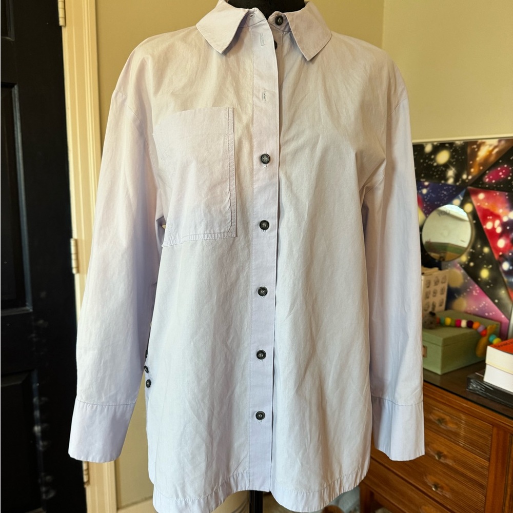 ba&sh blue button down shirt with patch pocket, side buttons, shirttail hem